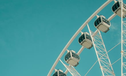 Ferris wheel cabins against clear blue sky Exterior at Sheffield Student Accommodation