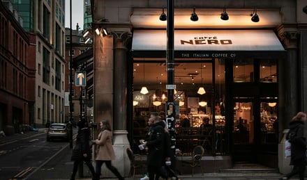 Street view with Caffe Nero shop front exterior at Manchester Student Accommodation