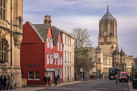 Red building with street sign exterior at Oxford Student Accommodation