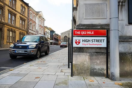 Street sign with cars and buildings exterior at Southampton Student Accommodation