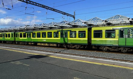 green dart train at station exterior