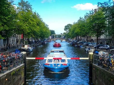 Boats and trees line canal exterior
