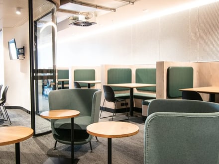 Modern seating booths with tables study area at Yugo Berkeley Street in Melbourne Student Accommodation