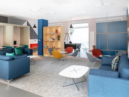 Blue sofas pool table and seating area living room at The Tannery in Dublin Student Accommodation