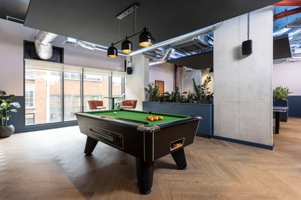 Pool table with balls and cues communal area at Hayloft Point in London Student Accommodation