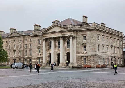 Grand stone building with columns and courtyard exterior at Trinity College Dublin Accommodation