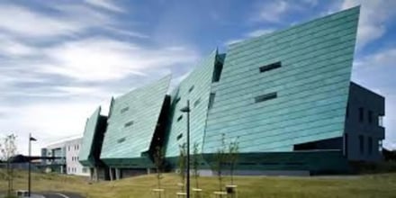 Modern green building with angled facade exterior at Galway Mayo Institute Of Technology Accommodation