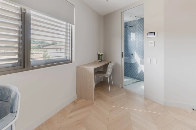 Desk and chair with ensuite bathroom Study area at UKO Kensington in Sydney Student Accommodation