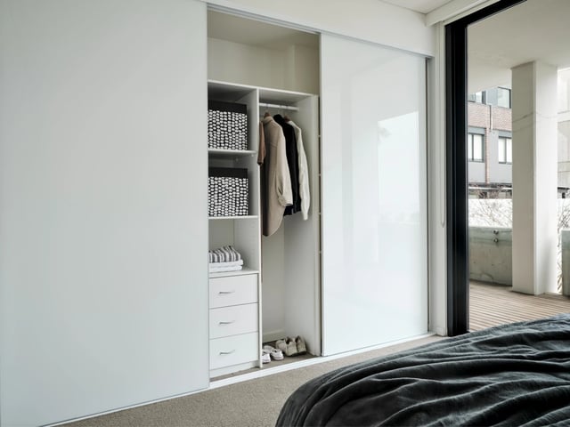Wardrobe with storage boxes clothing and drawers bedroom at UKO Camperdown in Sydney Student Accommodation