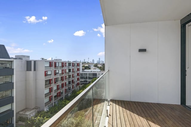 Wooden balcony overlooking apartment buildings exterior at UKO Camperdown in Sydney Student Accommodation