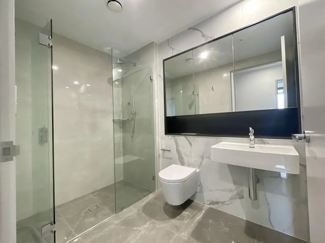 Toilet sink shower mirror and cabinet bathroom at Belong Parramatta in Sydney Student Accommodation