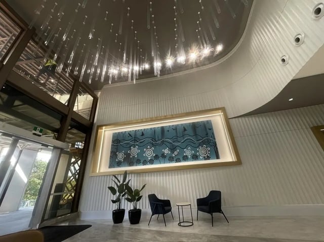 Artwork two chairs and plants communal area at Belong Parramatta in Sydney Student Accommodation