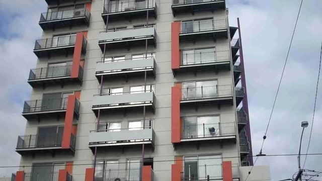 Balconies on modern apartment building exterior at Student Living - 570 Swanston in Melbourne Student Accommodation