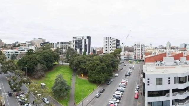 Cityscape with park and parking lot exterior at Student Living D1 in Melbourne Student Accommodation