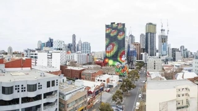 City buildings with colorful mural exterior view at Student Living D1 in Melbourne Student Accommodation