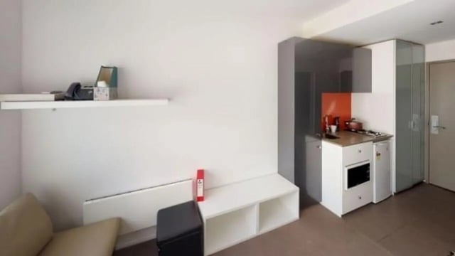 Shelves objects kitchen counter sink and stove kitchen at Student Living D1 in Melbourne Student Accommodation