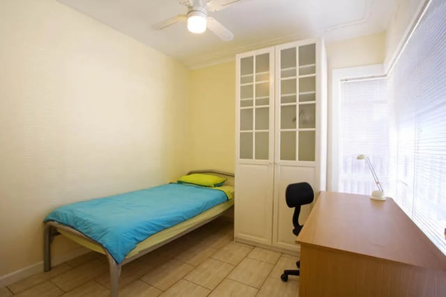 Bed desk wardrobe with chair bedroom study area at Classical House in Melbourne Student Accommodation