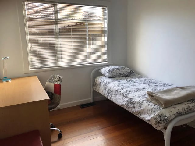 Single bed desk and chair bedroom at Classical House in Melbourne Student Accommodation