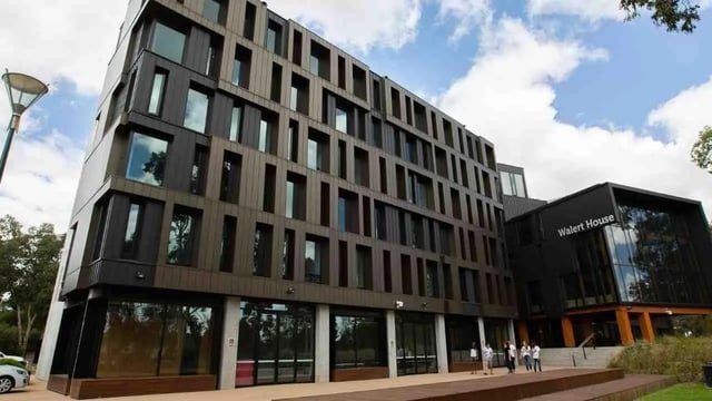 Modern student housing building with many windows exterior at UniLodge @ RMIT Bundoora-Walert House in Melbourne Student Accommodation