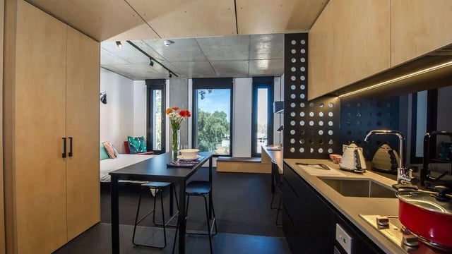 Modern studio with kitchen bed and table at UniLodge @ RMIT Bundoora-Walert House in Melbourne Student Accommodation