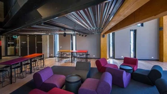 Colorful sofas and tables in common area. Living room at UniLodge @ RMIT Bundoora-Walert House in Melbourne Student Accommodation
