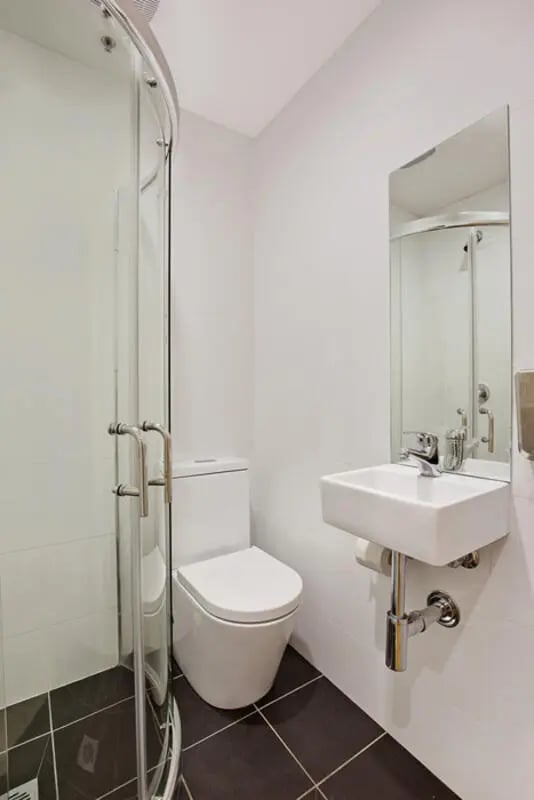 Toilet sink shower and mirror bathroom at Link2 Central in Sydney Student Accommodation