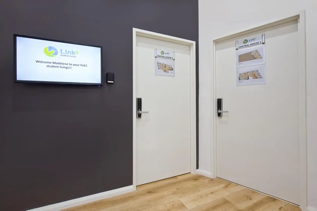 Screen display doors and floor hallway exterior at Link2 Central in Sydney Student Accommodation