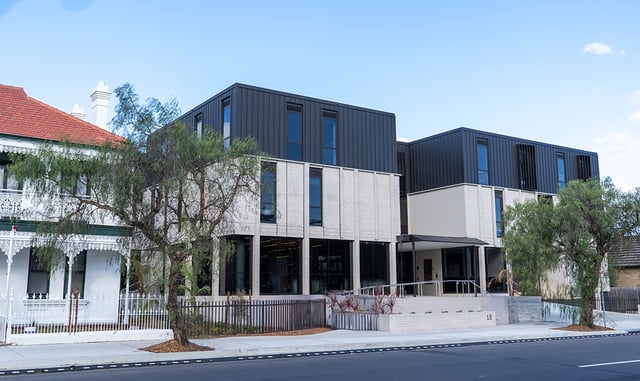 Modern building with brick and dark metal exterior exterior at The Switch Kensington in Sydney Student Accommodation