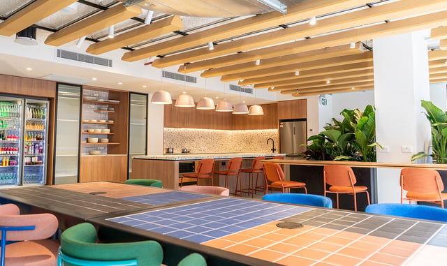 Communal kitchen with fridges and island communal space at The Switch Kensington in Sydney Student Accommodation
