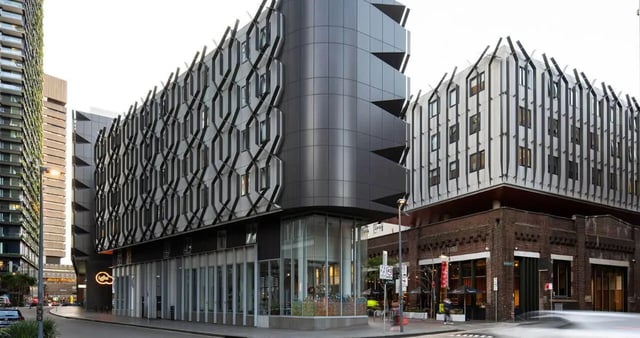 Modern building facade with balconies and windows exterior at Iglu Broadway in Sydney Student Accommodation