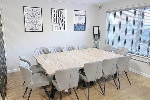 Large table with chairs artwork and window dining room at Metchley Hall in Birmingham Student Accommodation