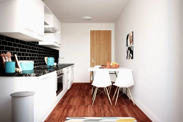 Modern kitchen with dining area kitchen at Moss Court in Manchester Student Accommodation