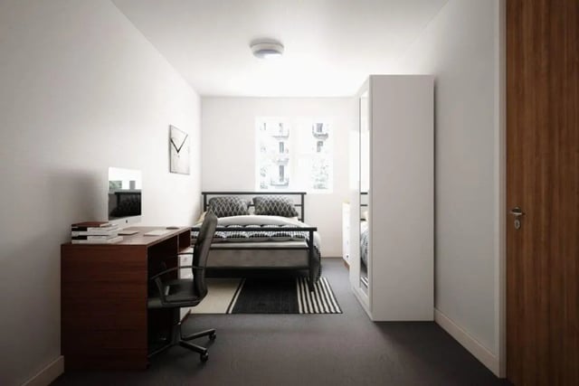 Desk computer bed wardrobe bedroom at Moss Court in Manchester Student Accommodation