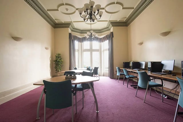Computers tables and chairs in large room study area at Oxley Residence in Leeds Student Accommodation