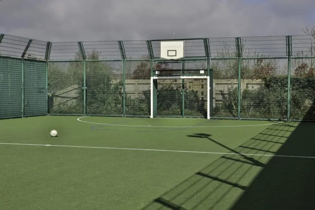 Football court with goal and basketball hoop outdoor court at Madison Gardens in Nottingham Student Accommodation