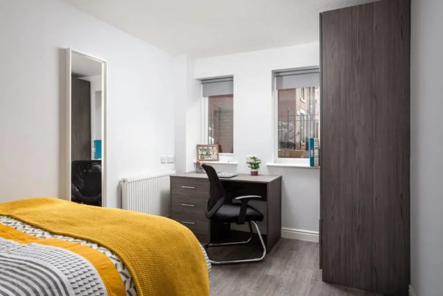 Bed desk chair mirror wardrobe bedroom at Royal Park Road in Leeds Student Accommodation