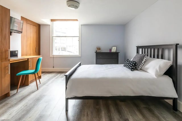 Bed desk TV wardrobe and dresser bedroom at Standard Hill in Nottingham Student Accommodation