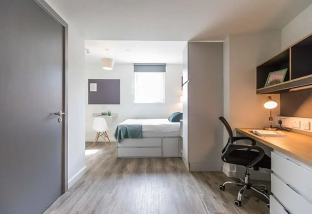 Bed desk chair bulletin board and bed bedroom at The Cam Foundry in Cambridge Student Accommodation