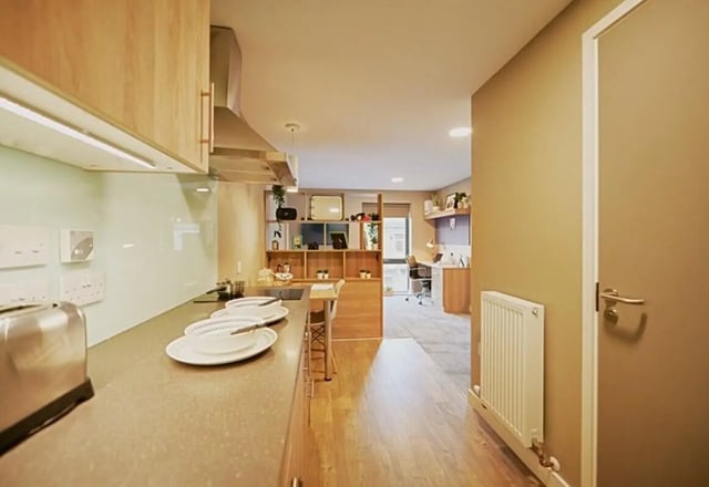Kitchen area with study and living space Studio apartment at The Combworks in Aberdeen Student Accommodation