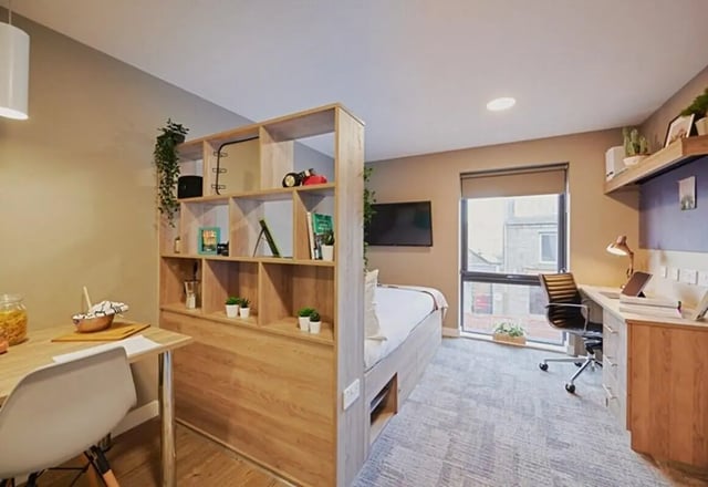 Bed study desk and shelving unit bedroom at The Combworks in Aberdeen Student Accommodation