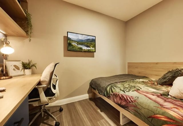 Bed desk chair TV shelf Bedroom at The Spireworks in Oxford Student Accommodation