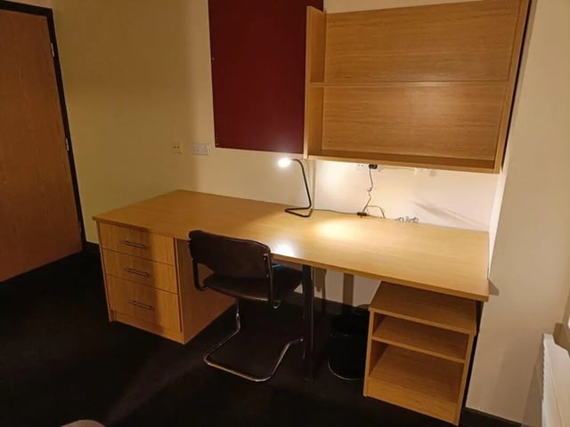 Desk chair lamp shelving study area at Asha House in Loughborough Student Accommodation