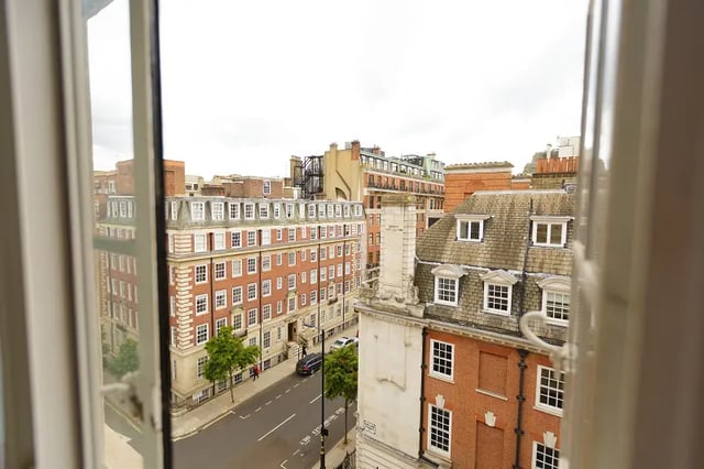City buildings seen from an open window exterior at AXO Oxford Circus in London Student Accommodation