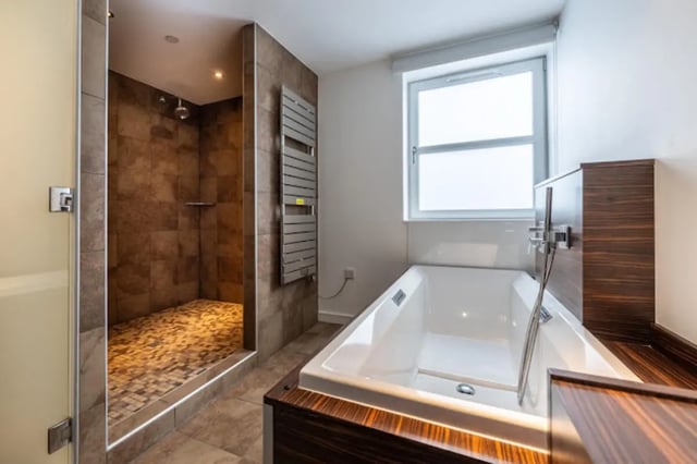 Modern bathroom with shower and bathtub Bathroom at Bauhaus Student Langstane Place in Aberdeen Student Accommodation