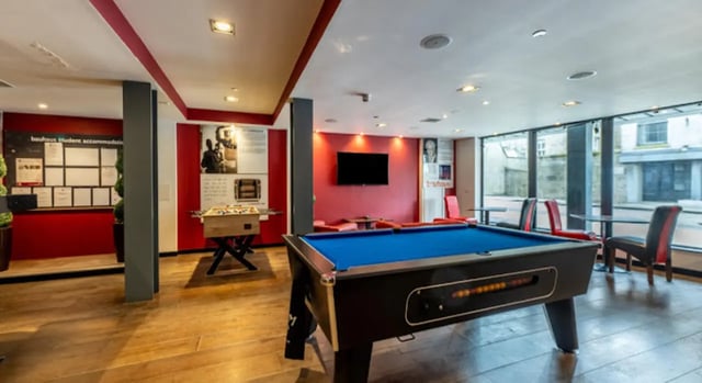 Pool table foosball table modern lounge area at Bauhaus Student Langstane Place in Aberdeen Student Accommodation