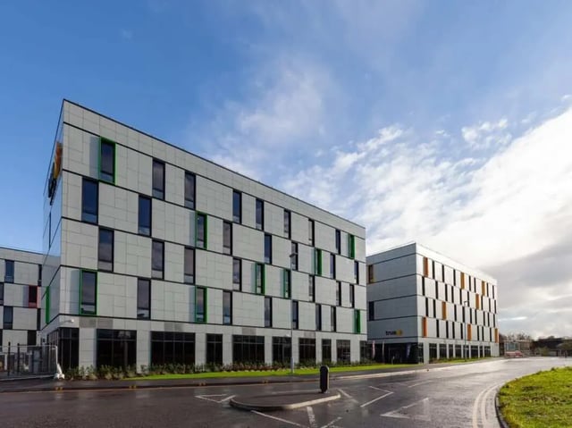 Modern student accommodation buildings with colourful window frames exterior at True Swansea in Swansea Student Accommodation