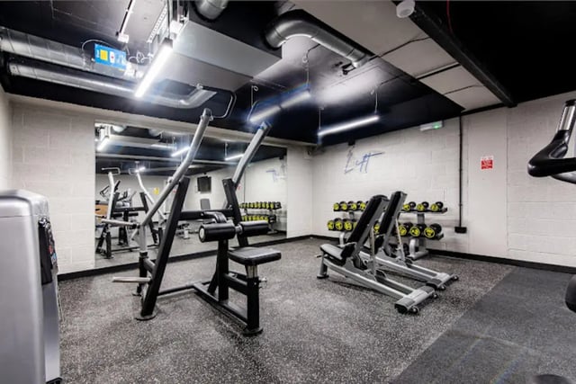 Weight machines and dumbbells in gym at Broadgate House Student Living in Nottingham Student Accommodation