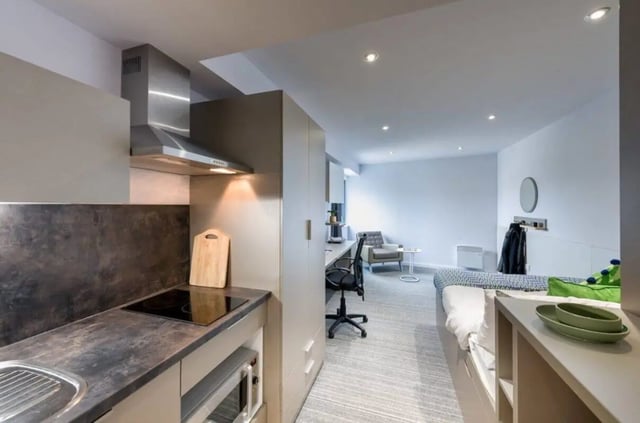 Kitchen counter hob microwave desk chair bed studio apartment at The Kingfisher in Exeter Student Accommodation