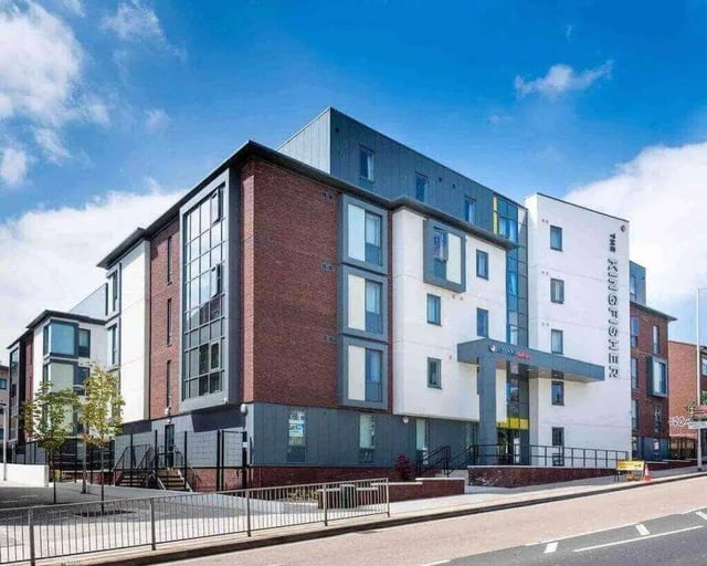 Modern brick and white student accommodation building exterior at The Kingfisher in Exeter Student Accommodation