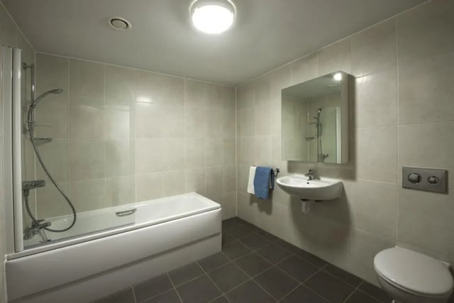 Shower bathtub sink toilet mirror towels bathroom at The Electra in Liverpool Student Accommodation